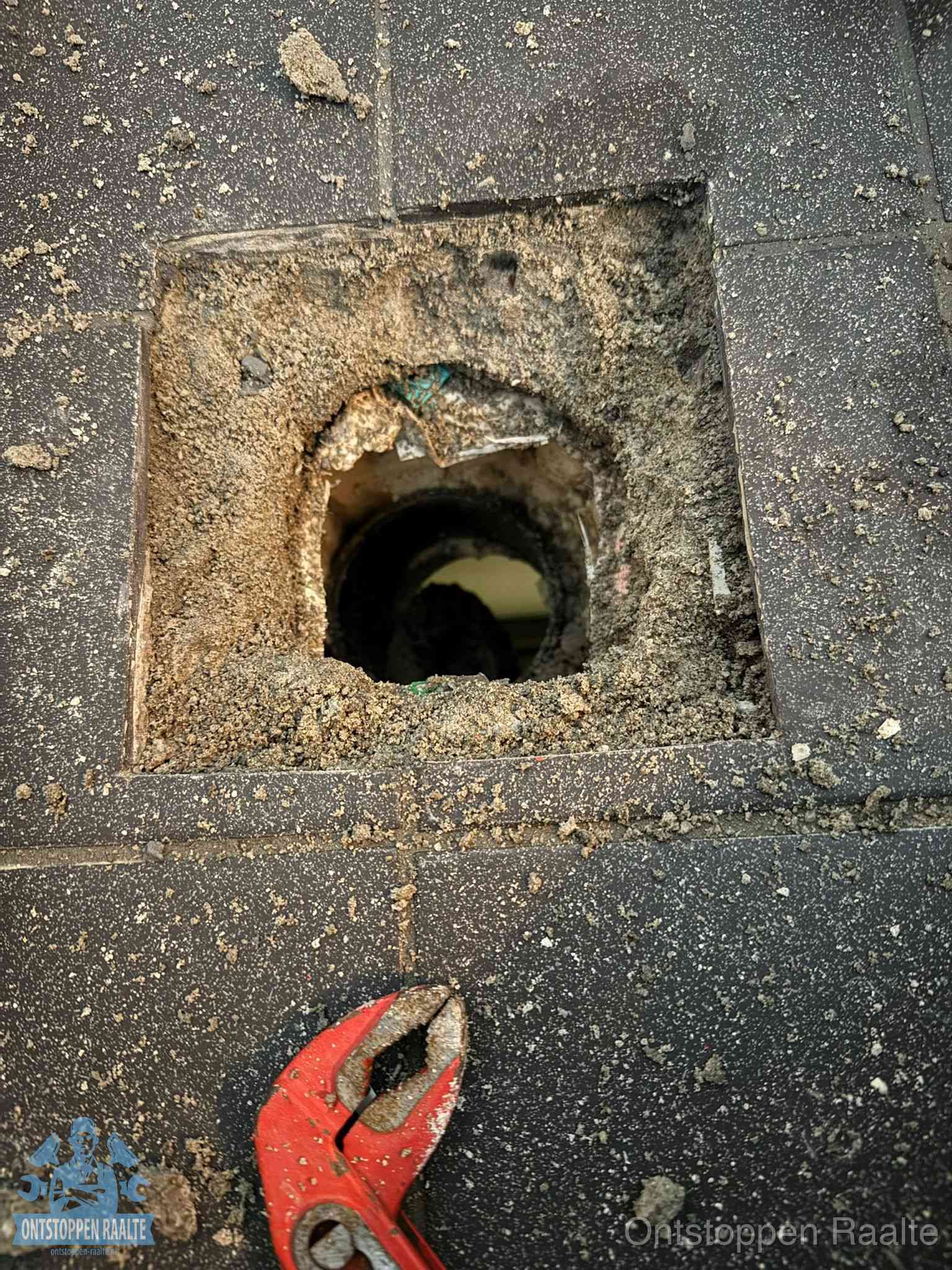 Rioolputje erfgrens eigendom in Raalte